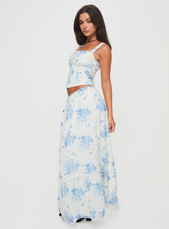   side view of model wearing Princess Polly Modern Girl Maxi Skirt White / Blue Floral Maxi Skirts Skirts 