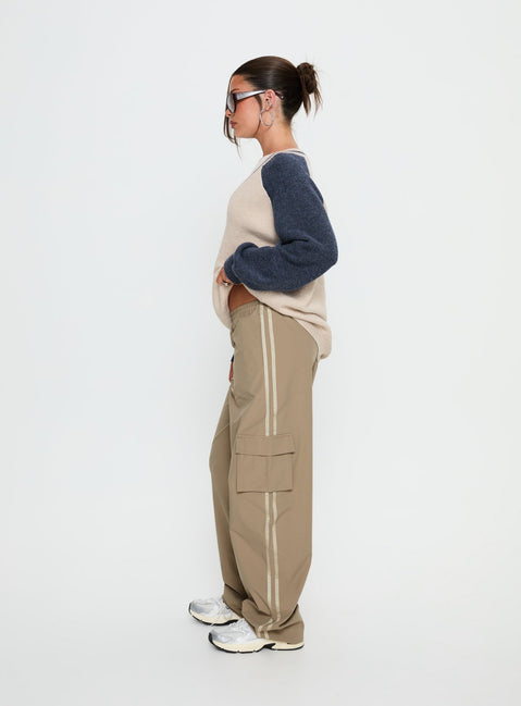 side view of model wearing Princess Polly Ellyn Baggy Cargo Pants Khaki Mid Rise Pants Pants 