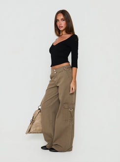 Showcasing Kellenna Straight Leg Low Rise Cargo Pants Khaki in dark khaki featuring a belt with low-rise detail side view of model wearing Princess Polly