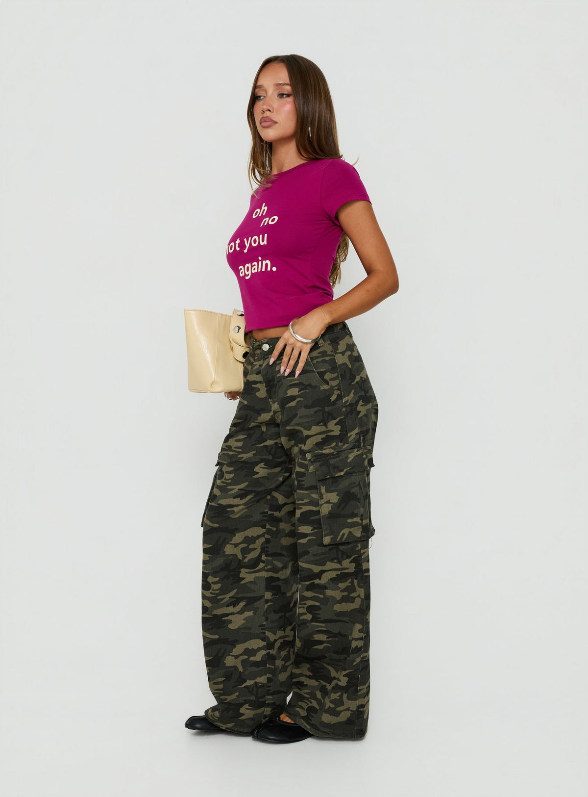 Styled in Hudsen Cargo Pants Camo womens regular pants with mid-rise waist and camo print side view of model wearing Princess Polly