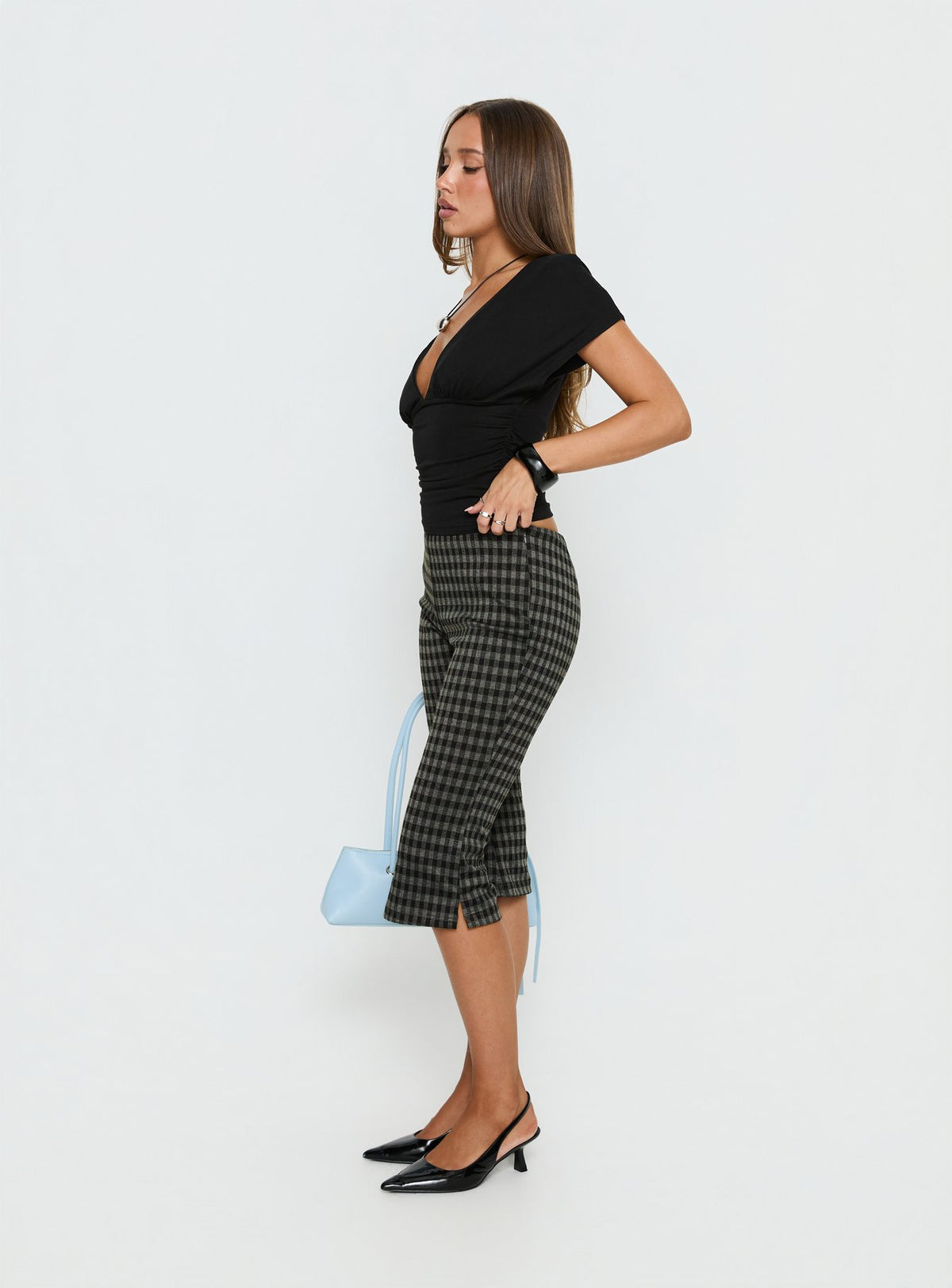 side view of model wearing Princess Polly Lights Are Off Capri Pants Multi Mid Rise Pants Pants 
