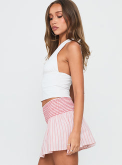   side view of model wearing Princess Polly Lilypilly Shirred Mini Skirt Pink Multi Mini Skirts Skirts 