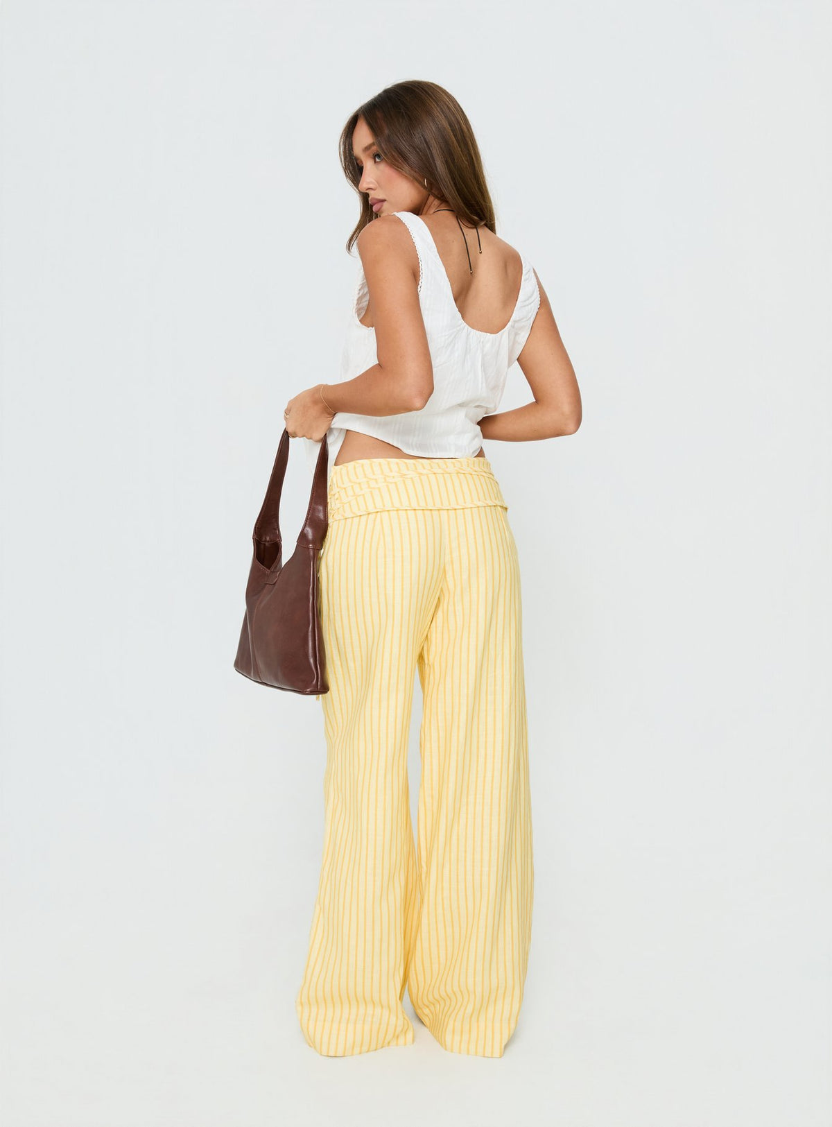 back view of model wearing Princess Polly Silver Moon Pants Yellow Stripe Low Rise Pants Pants 