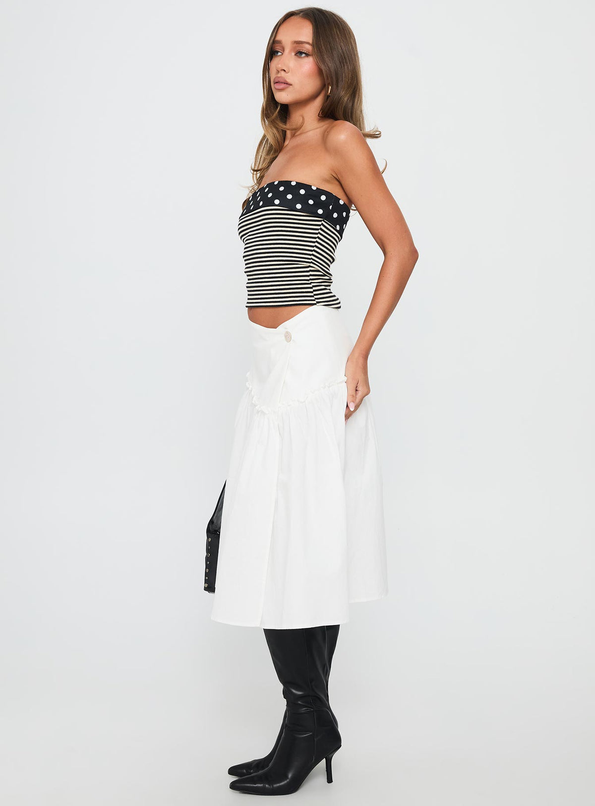   side view of model wearing Princess Polly Jonsie Tiered Frill Midi Skirt White Midi Skirts Skirts 