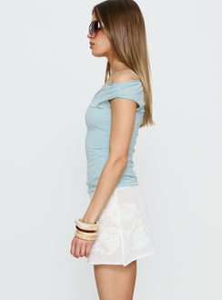 Showcasing Roziana Crochet Mini Skirt White womens-skirts in mini length side view of model wearing Princess Polly
