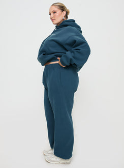 side view of model wearing Princess Polly Princess Polly Track Pants Block / Cursive Text Slate Curve Pants 