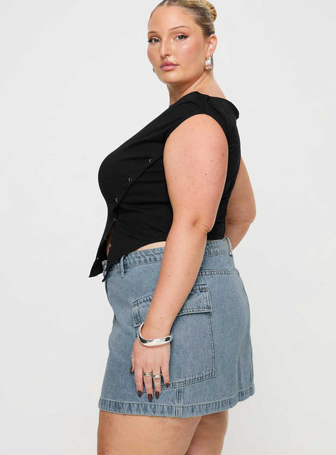   side view of model wearing Princess Polly Zakai Cargo Denim Mini Skirt Light Blue Denim Curve Mini Skirts Skirts 