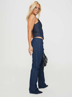 side view of model wearing Princess Polly Charismatic Low Rise Flared Jeans Dark Pinstripe Low Rise Jeans Jeans 