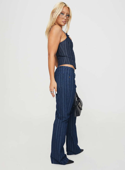 side view of model wearing Princess Polly Charismatic Low Rise Flared Jeans Dark Pinstripe Low Rise Jeans Jeans 