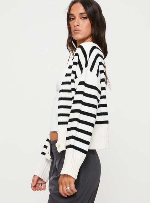 side view of model wearing Princess Polly Karlson Striped Cardigan Cream / Black cropped Jumpers 