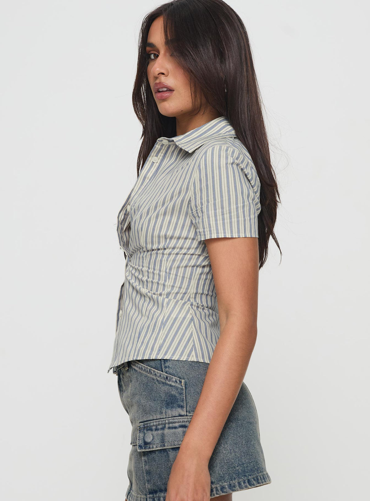 side view of model wearing Princess Polly Peppy Shirt Stripe Short Sleeves V-Neck 
