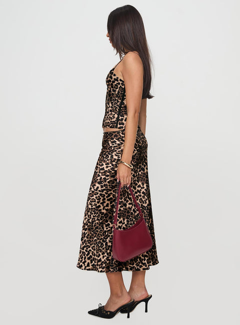  side view of model wearing Princess Polly Enigmatic Maxi Skirt Leopard Maxi Skirts Skirts 