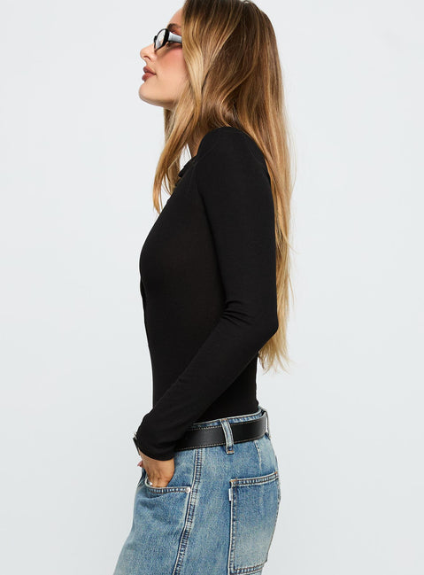 side view of model wearing Princess Polly Kandis Long Sleeve Bodysuit Black Long Sleeve Tops Bodysuit 