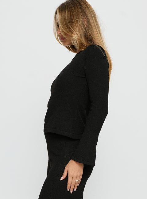 side view of model wearing Princess Polly Jaede Off Shoulder Knit Sweater Black Cropped Jumpers Jumpers 