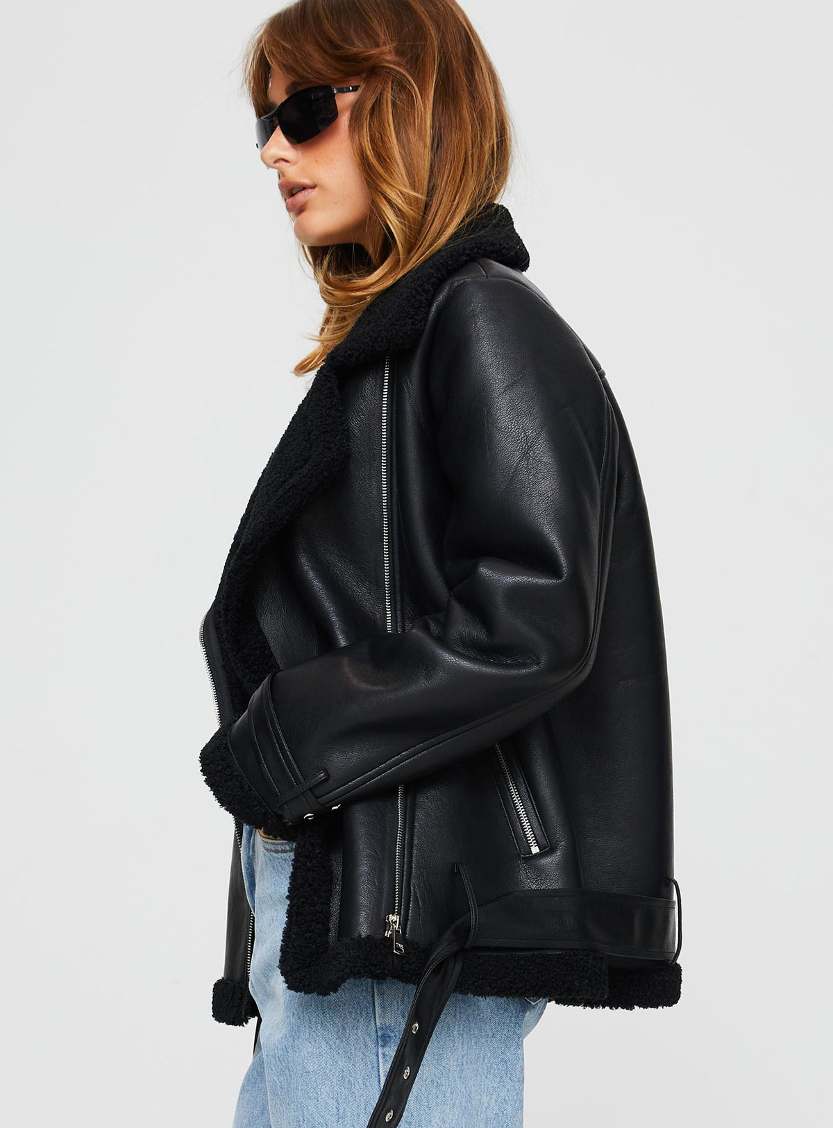 Faux leather jacket Silver-toned hardware, zip fastening down front, twin hip pockets, adjustable & removable belt Non-stretch material, shearling lined