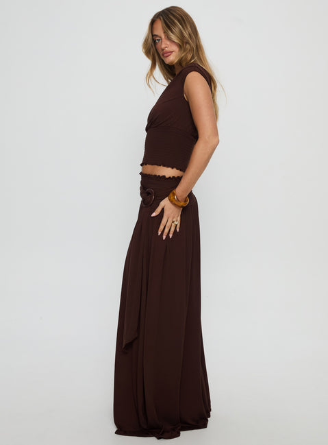   side view of model wearing Princess Polly Full Orbit Shirred Maxi Skirt Chocolate Brown Maxi Skirts Skirts 