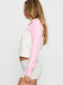 side view of model wearing Princess Polly Take The Lead Zip Through Knit Sweater Pink / White Cropped Jumpers Jumpers 