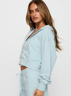 side view of model wearing Princess Polly Revive Zip Through Hoodie Blue cropped Jumpers 