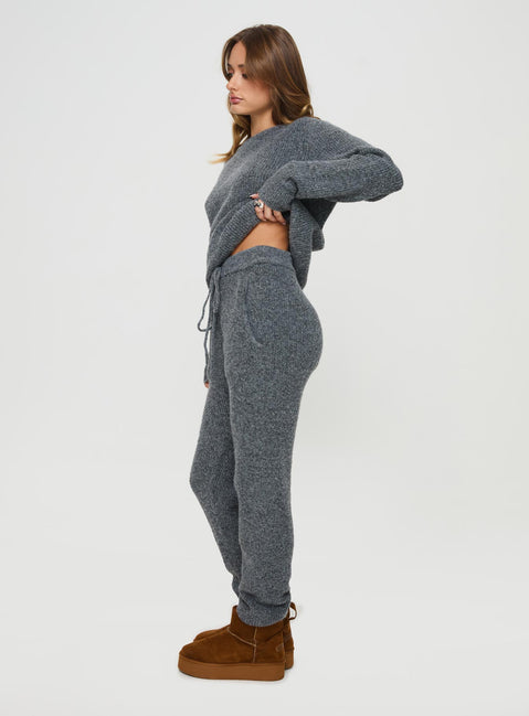 side view of model wearing Princess Polly Abrams Rib Knit Pants Charcoal Marle High Rise Pants Pants 