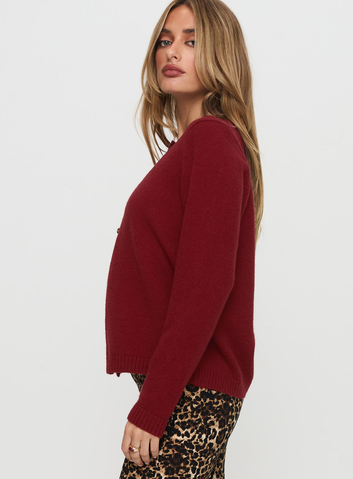 side view of model wearing Princess Polly Arica Button Up Knit Cardigan Red Longline Jumpers Jumpers 