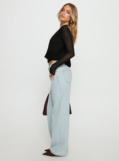 side view of model wearing Princess Polly Penny Mid Rise Straight Leg Jeans Light Denim Low Rise Jeans 