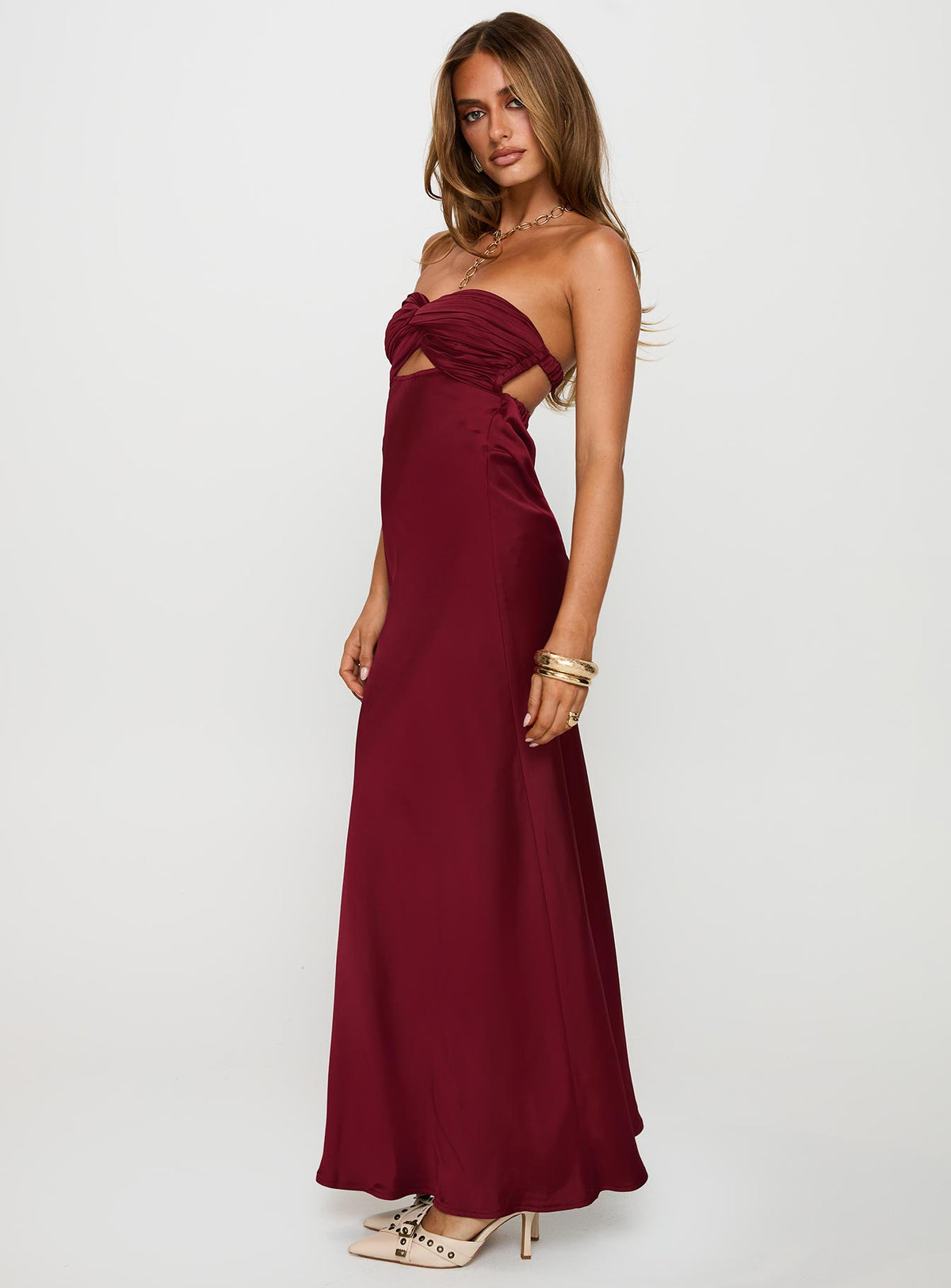 side view of model wearing Princess Polly Faviola Strapless Maxi Dress Burgundy Sweetheart Neckline 