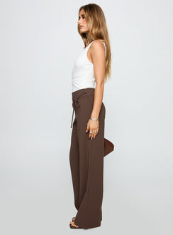 side view of model wearing Princess Polly Rush Hours Pants Chocolate High Rise Pants Pants 