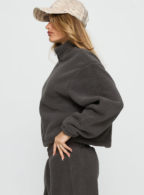 side view of model wearing Princess Polly Siberia Fleece Zip Up Jumper Charcoal regular Jumpers 