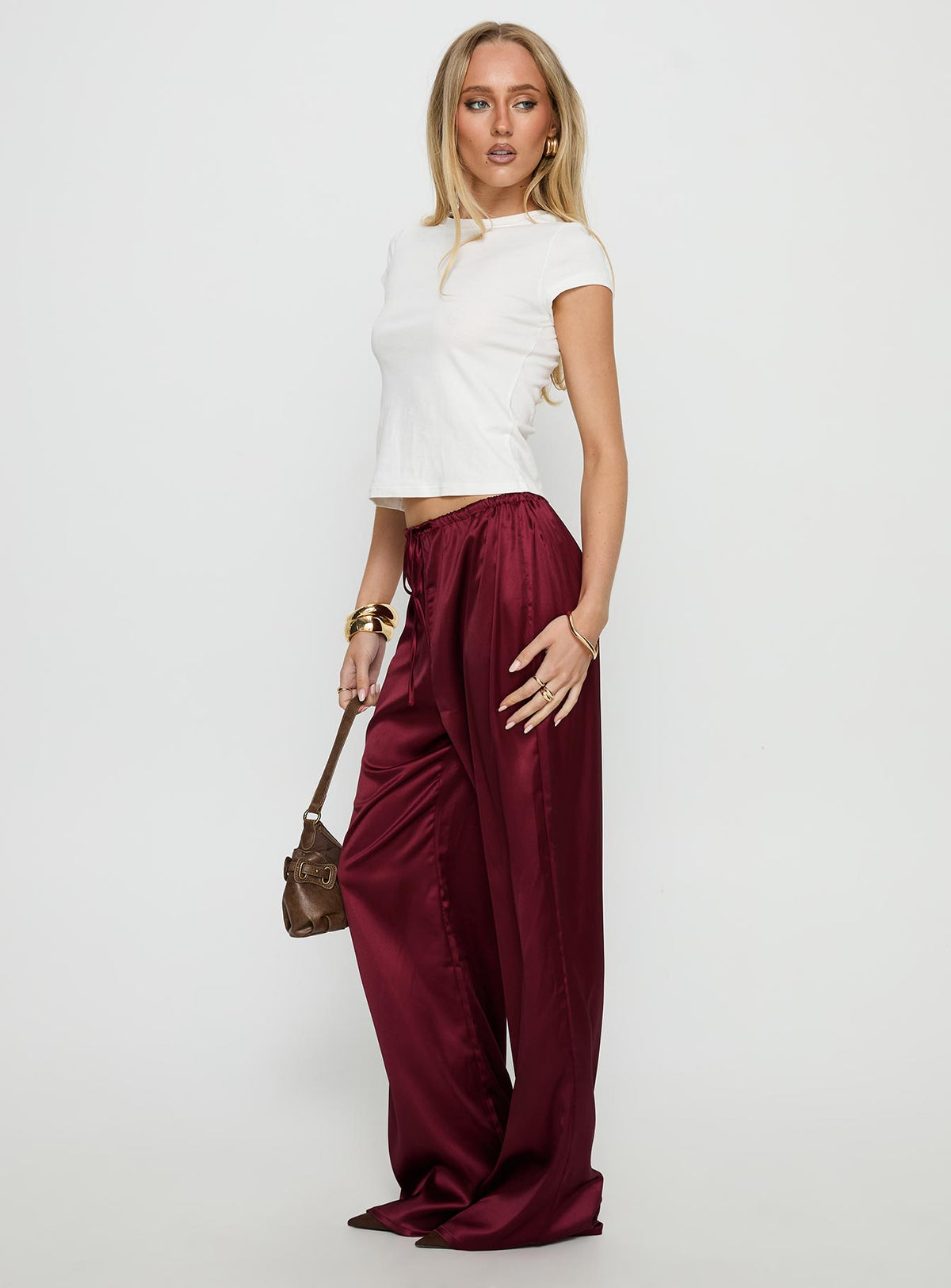 front view of model wearing Princess Polly Soulstar Satin Pants Wine Mid Rise Pants Pants 