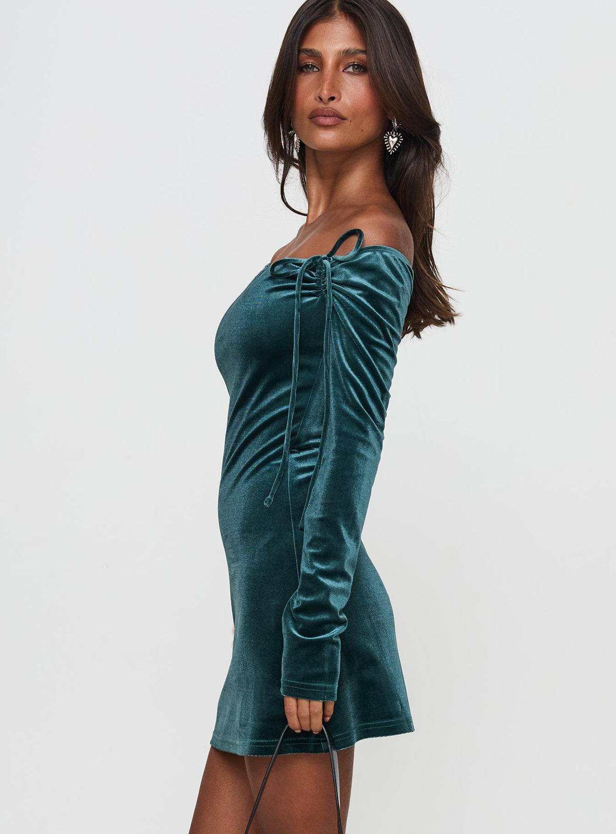 side view of model wearing Princess Polly Intertwine Long Sleeve Mini Dress Forest Green Straight Neck 