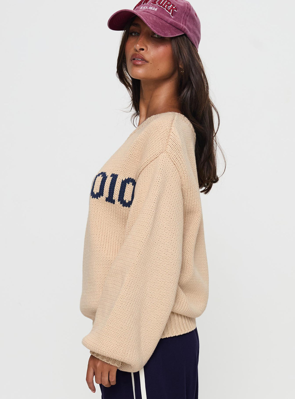 side view of model wearing Princess Polly Jadynn Off Shoulder Knit Sweater Cream Jumpers 