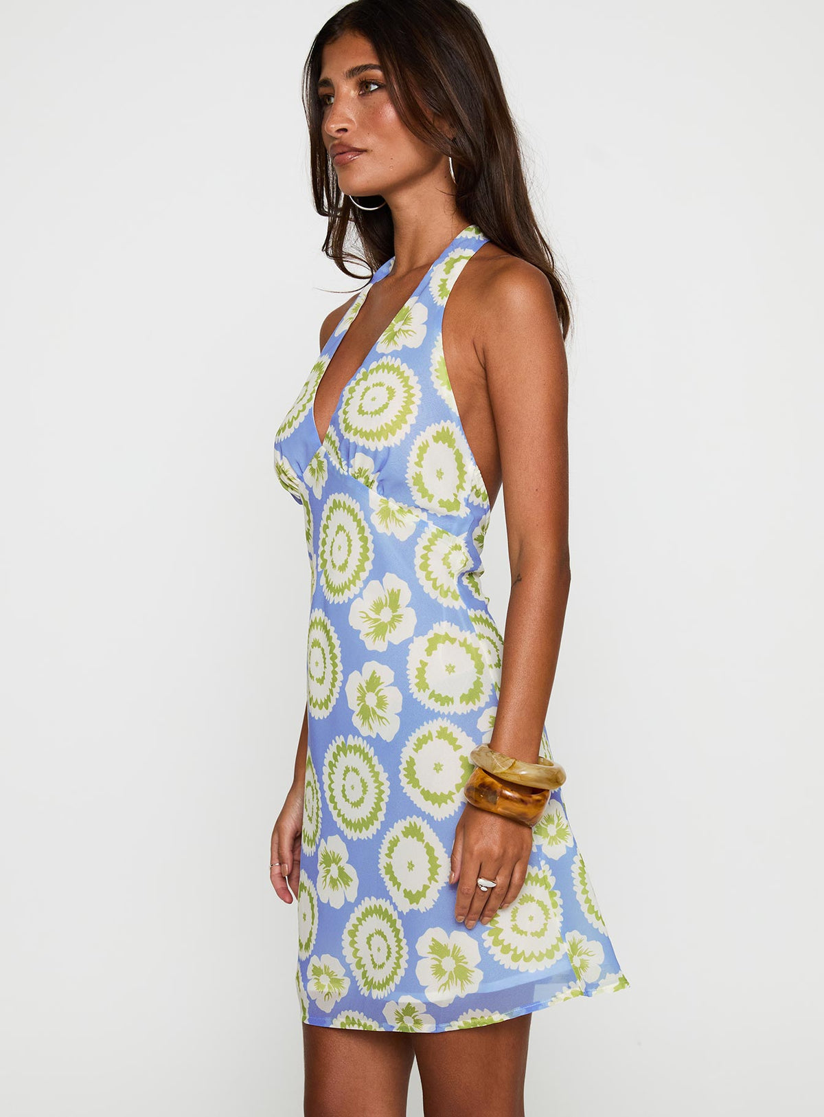 side view of model wearing Princess Polly Neelia Mini Dress Blue / Yellow Plunger 