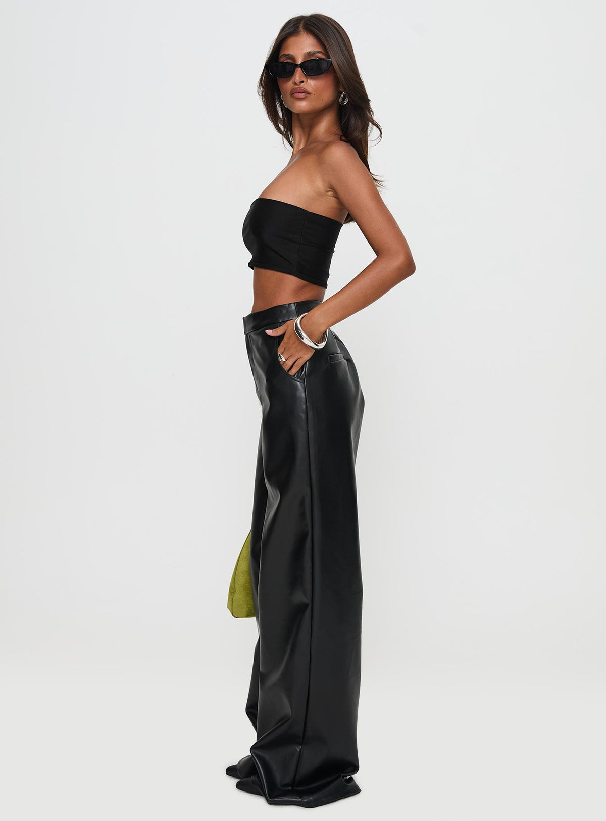 side view of model wearing Princess Polly Tempted Faux Leather Pant Black High Rise Pants Pants 