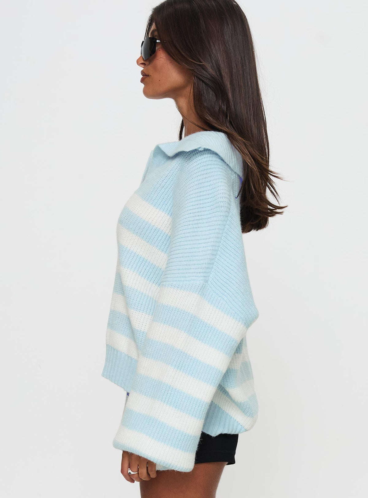 side view of model wearing Princess Polly Carolena Long Sleeve Collared Knit Sweater Blue / White Stripe Longline Jumpers Jumpers 