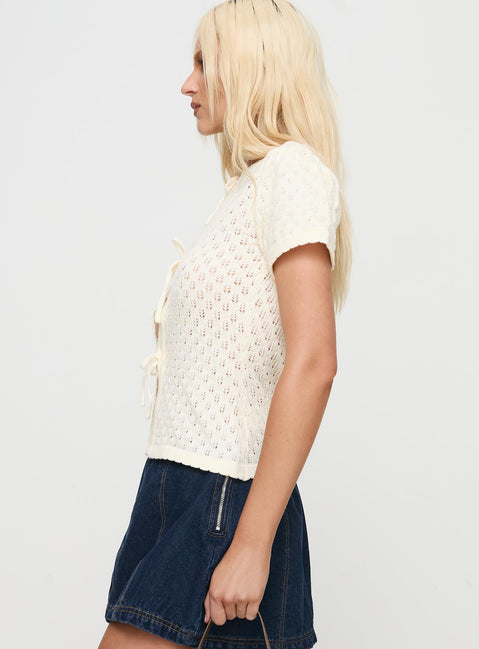 side view of model wearing Princess Polly Mari Knit Top Cream Short Sleeves Crew Neck 