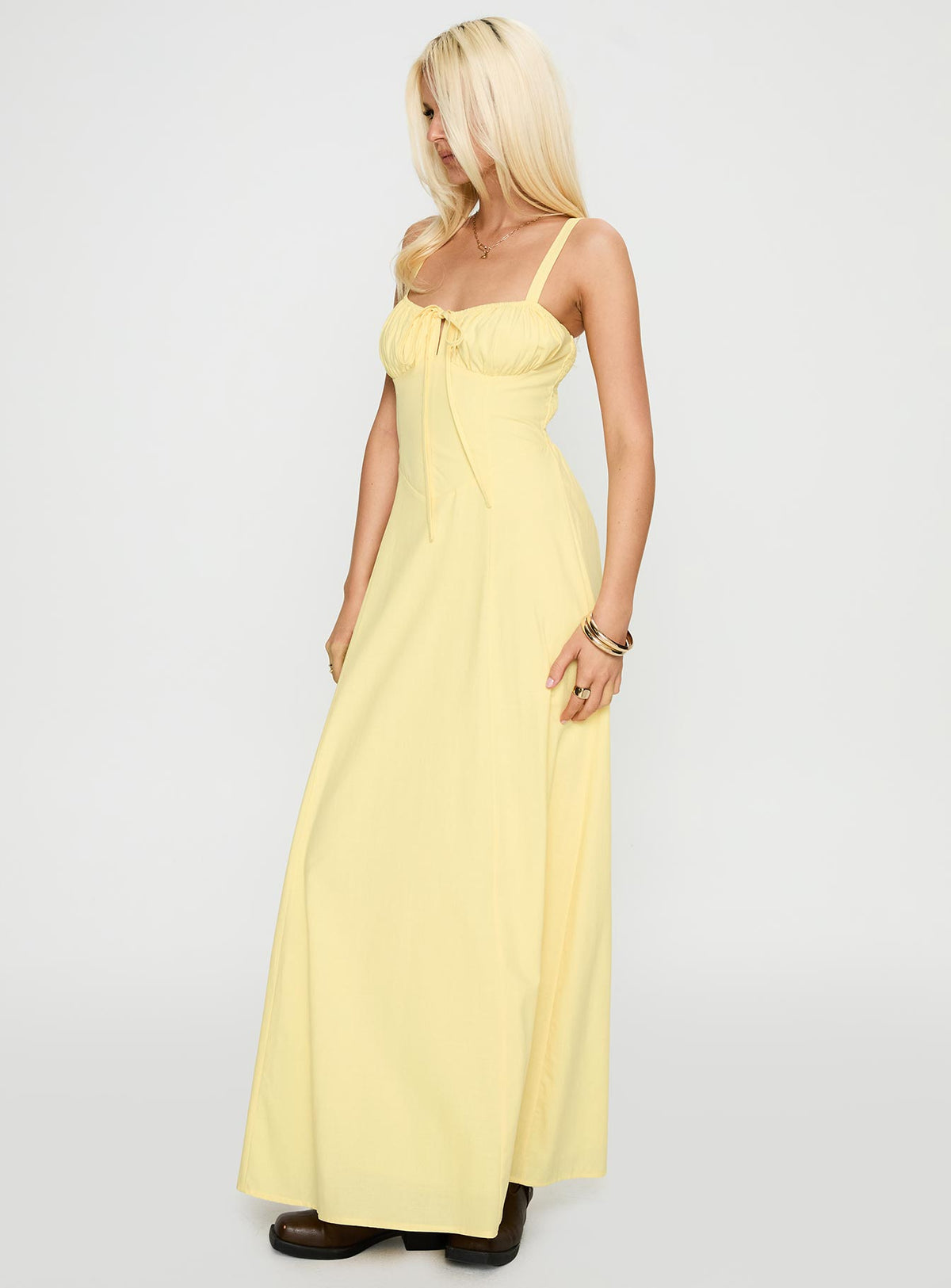 side view of model wearing Princess Polly Leticia Maxi Dress Lemon Sweetheart Neckline 