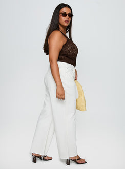 side view of model wearing Princess Polly Fawcett High Rise Straight Leg Jeans White Curve High Rise Jeans Jeans 