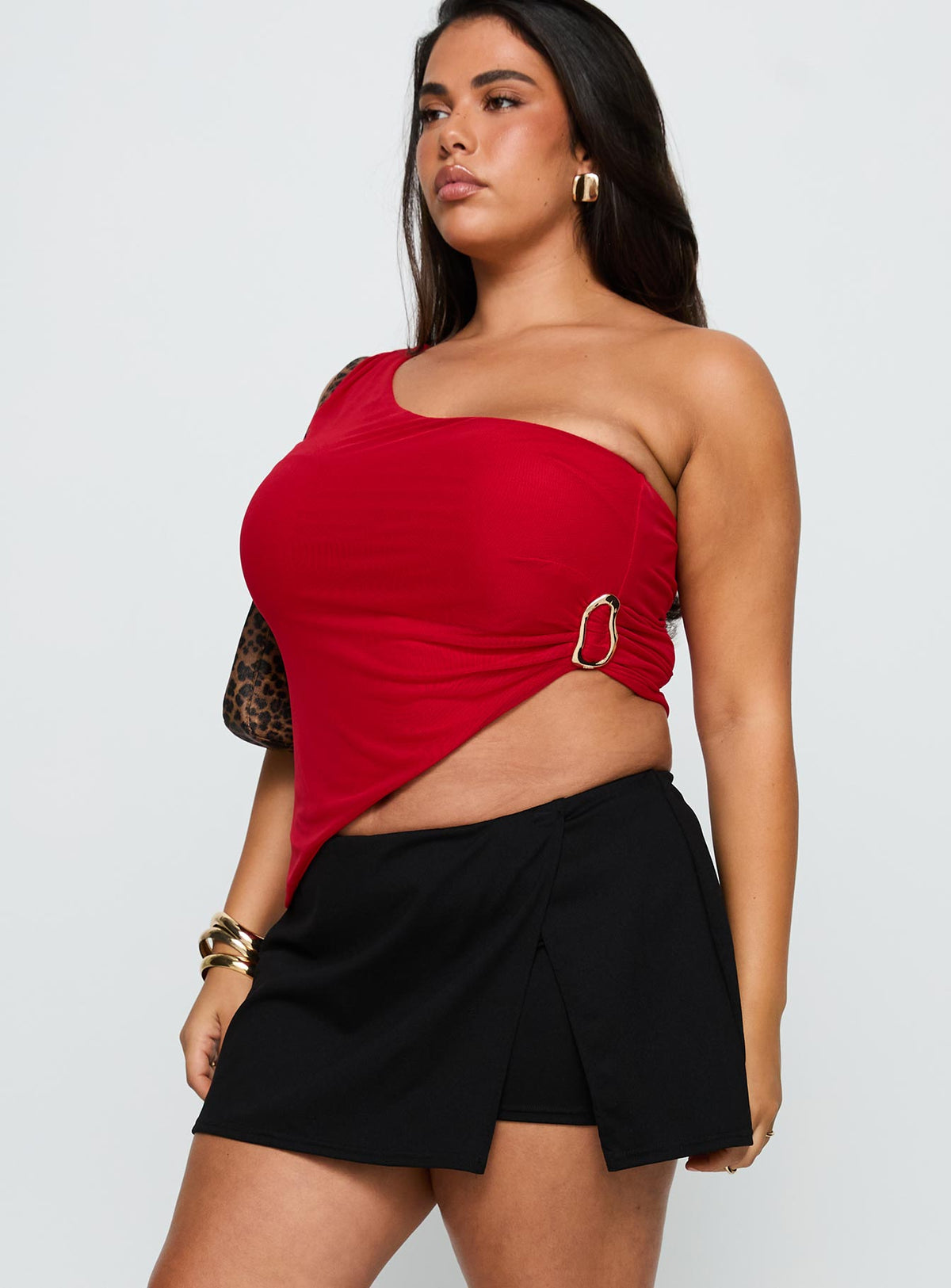 side view of model wearing Princess Polly For The Thrill Skort Black Curve High Waisted Shorts 