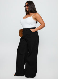 side view of model wearing Princess Polly Goldie High Rise Wide Leg Jeans True Black Curve High Rise Jeans Jeans 