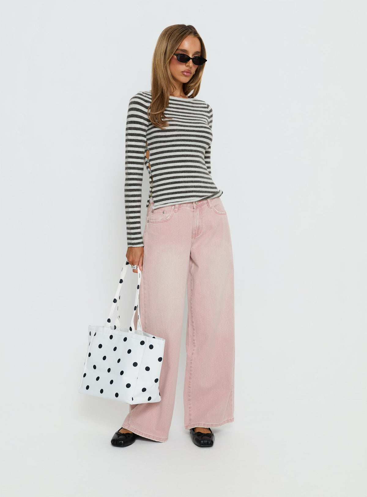 side view of model wearing Princess Polly Lucky Dip Mid Rise Straight Leg Jeans Washed Pink Mid Rise Jeans Jeans 