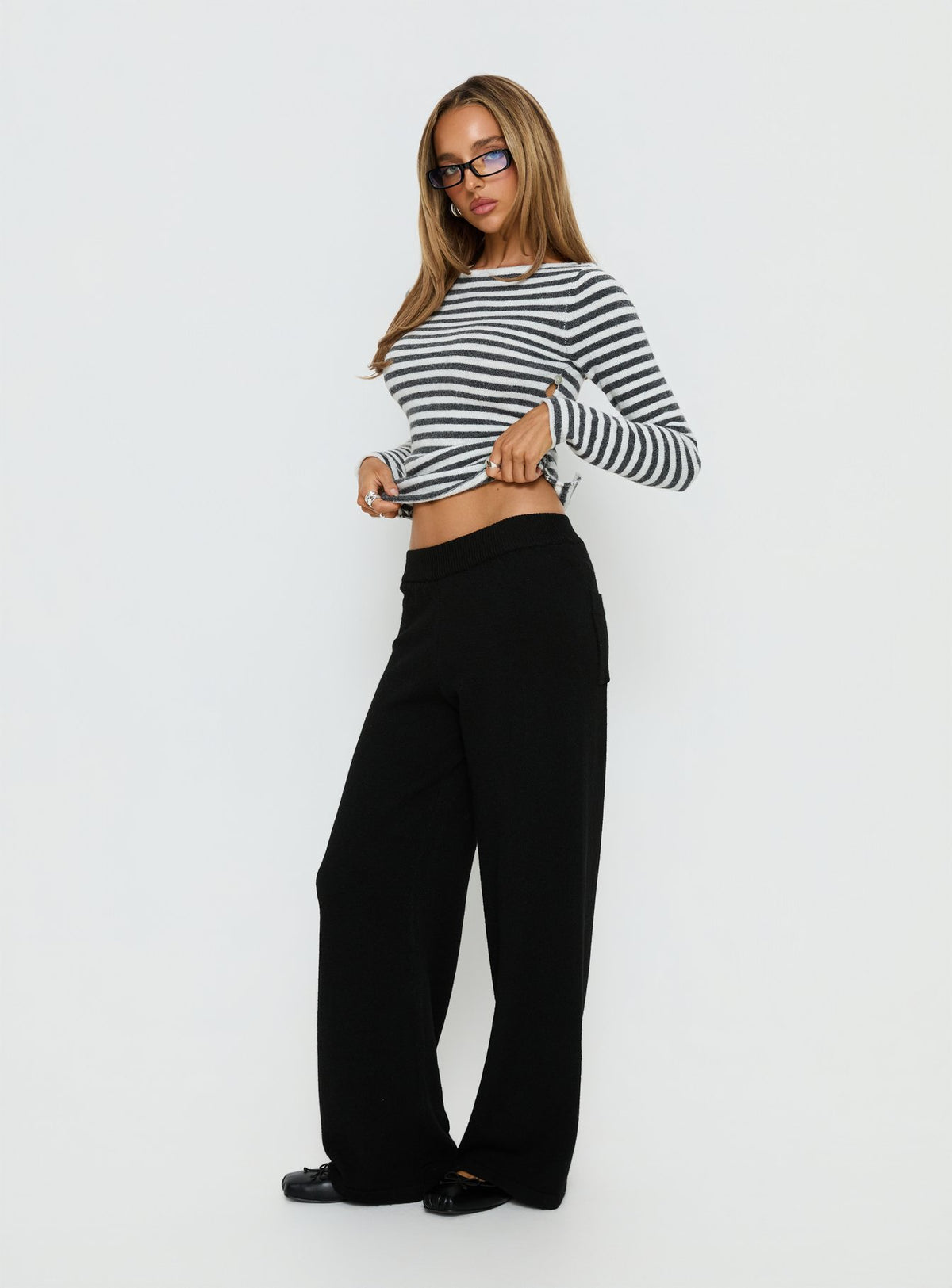 side view of model wearing Princess Polly Bekki Wide Leg Knit Pant Black High Rise Pants Pants 