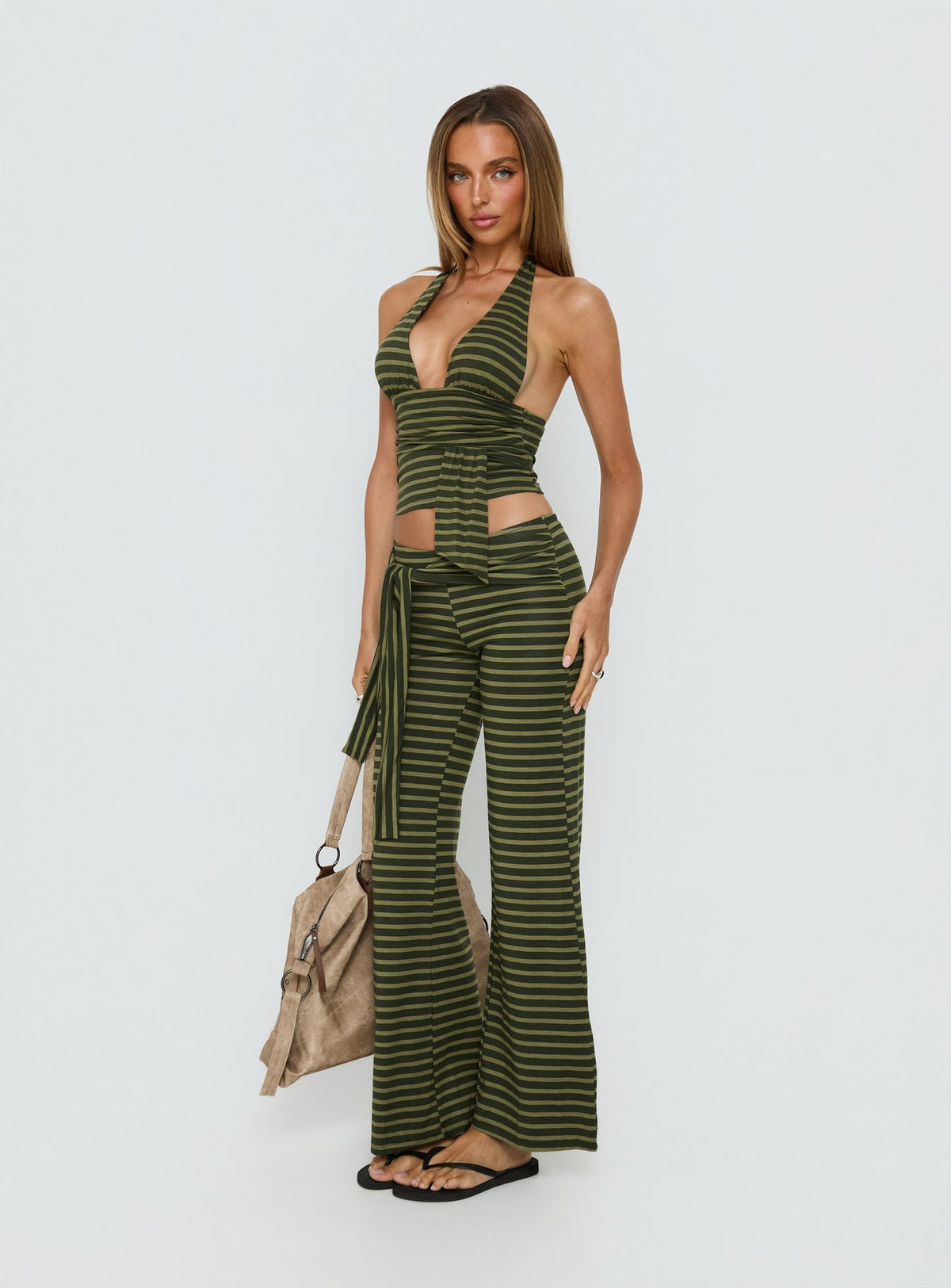 side view of model wearing Princess Polly Esata Tie Detail Pants Green Stripe Mid Rise Pants Pants 