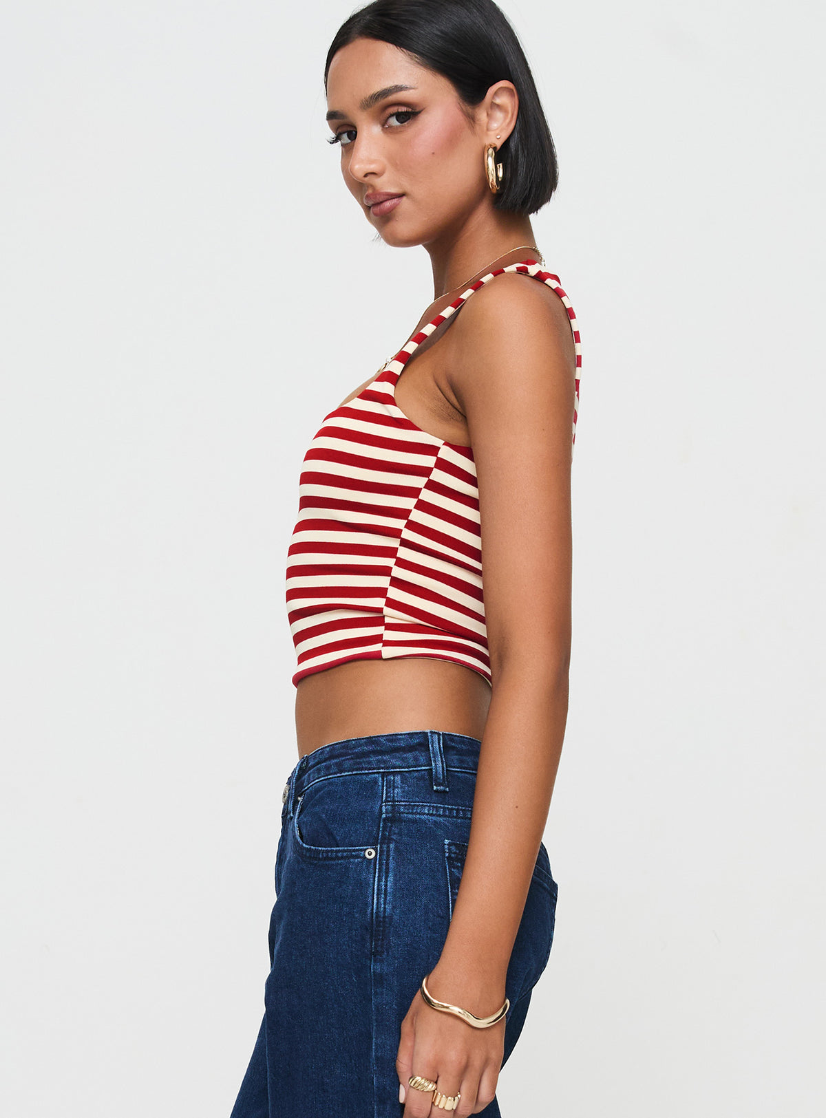 side view of model wearing Princess Polly Back In Time Top Red Stripe Sleeveless Square Neck 