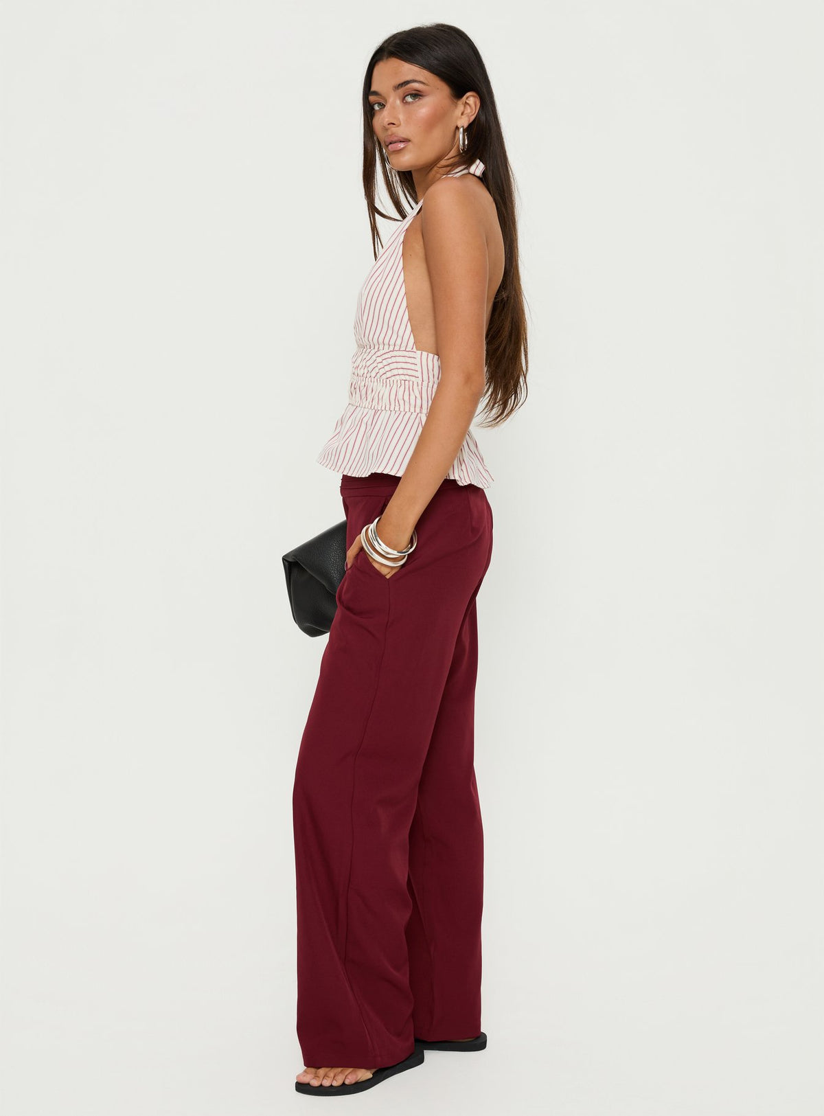 side view of model wearing Princess Polly Good Riddance Pleat Tie Slouch Pants Burgundy Mid Rise Pants Pants 
