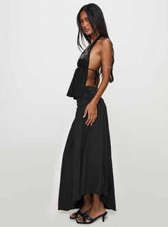   side view of model wearing Princess Polly Gezabele Asymmetrical Maxi Skirt Black Maxi Skirts Skirts 