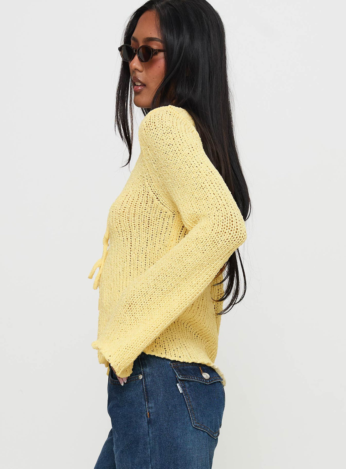 side view of model wearing Princess Polly Swain Knit Cardigan Lemon Jumpers 