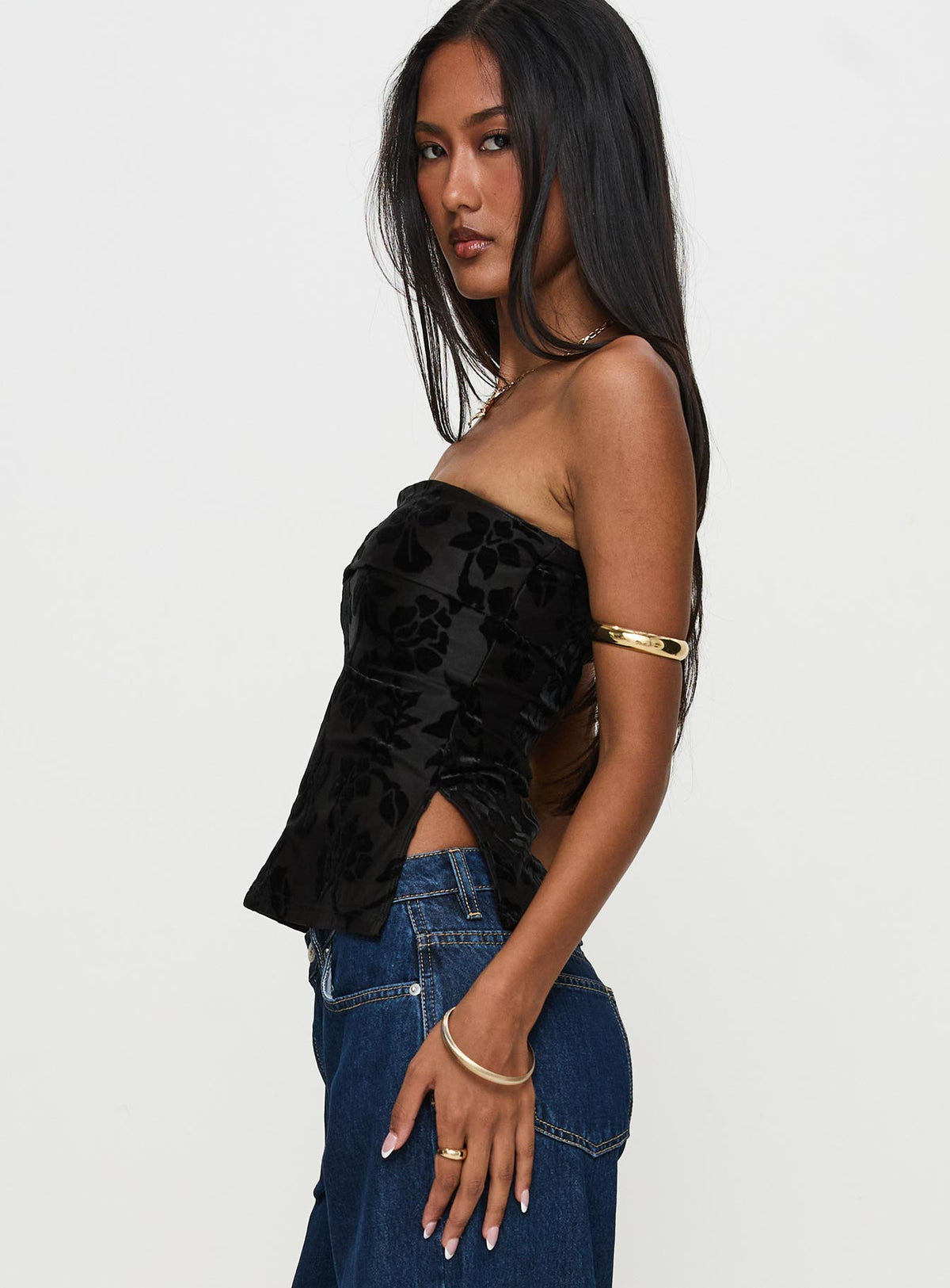 side view of model wearing Princess Polly Attlee Strapless Top Black Floral Sleeveless straight 