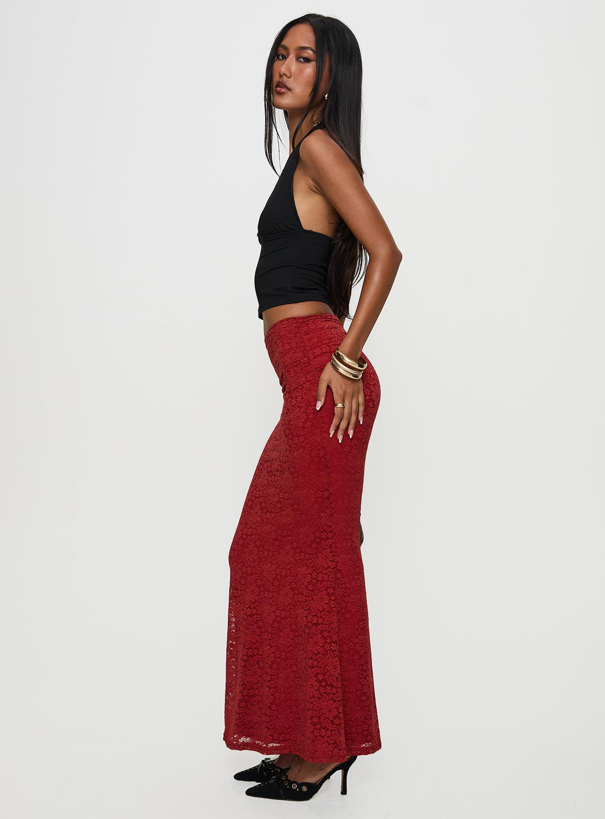   side view of model wearing Princess Polly Silene Maxi Skirt Red Skirts 