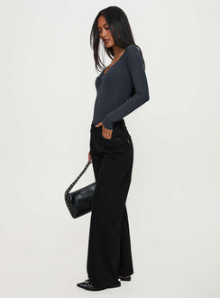 side view of model wearing Princess Polly Colemane Mid Rise Wide Leg Jeans Black High Rise Jeans Jeans 