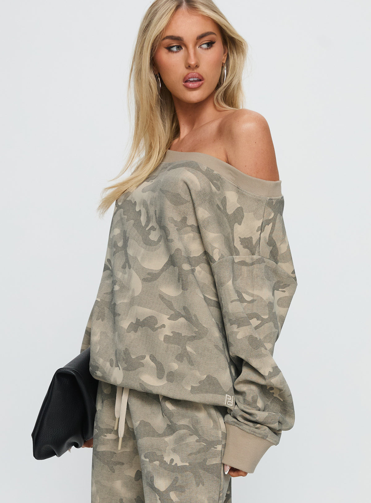side view of model wearing Princess Polly Wellness Off The Shoulder Jumper Washed Camo Jumpers 